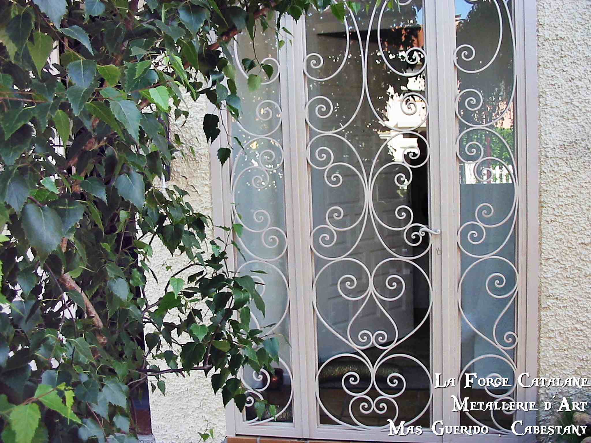 grille porte vitrage volute 2 fer Forge Catalane Cabestany.jpg